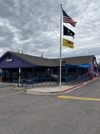 Nate's storefront by day with the crawfish flag flying