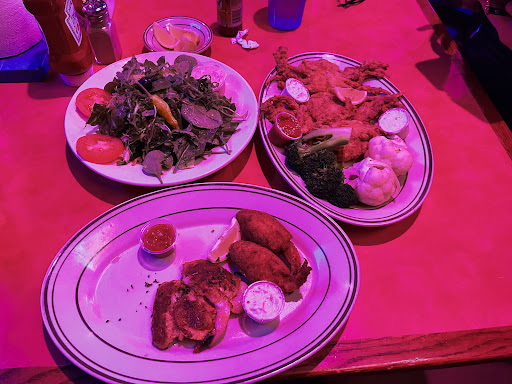 Fried seafood platters with fresh salad