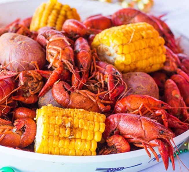 Fresh boiled crawfish with corn on the cob and red potatoes